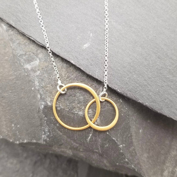 Two Gold Circles On Silver Chain Necklace